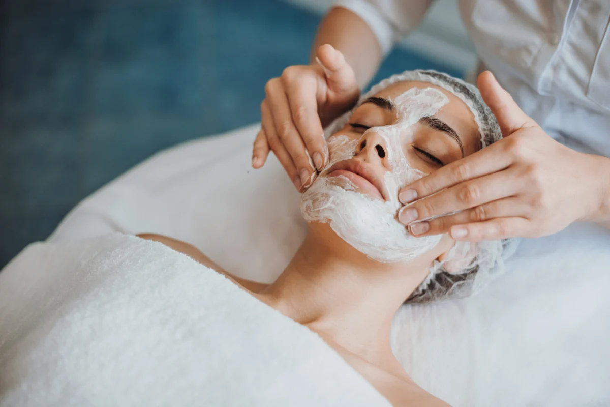Woman enjoying a relaxing facial treatment at the spa in Wakefield, MA | Infinite Beauty Med Spa